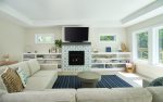 Elevate Your Viewing Experience in Urban Escape`s Cozy Living Room